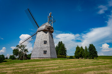 Old windmill in a country landscape