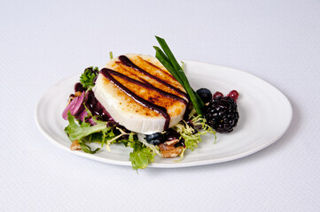 Goat cheese plate on a white background