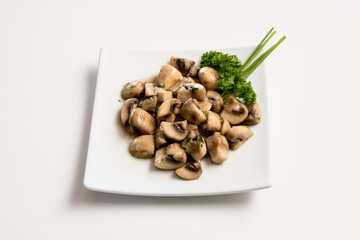 A plate of mushroom on a white background