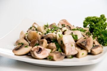 A plate of mushroom on a white background