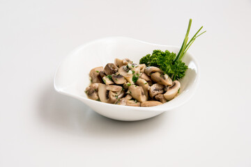 A plate of mushroom on a white background
