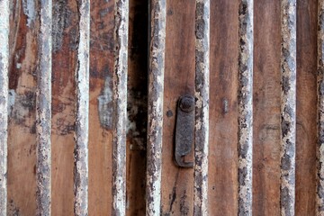 The texture of antique wooden windows that have been used for a long time.