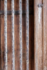 The texture of antique wooden windows that have been used for a long time.