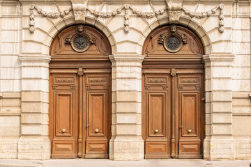 Lyon, two old wooden doors, typical building in the south of France
