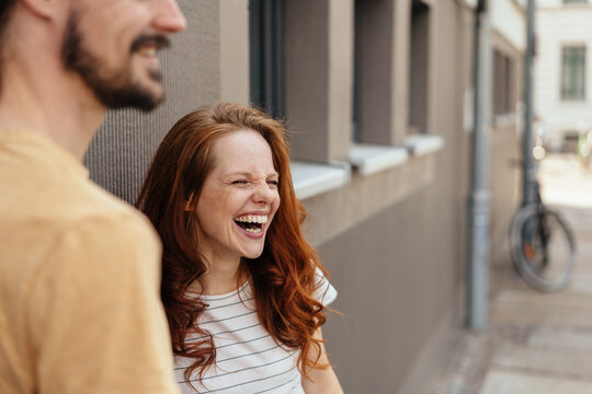 Young woman laughing in amusement