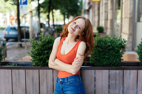 Friendly relaxed casual young redhead woman