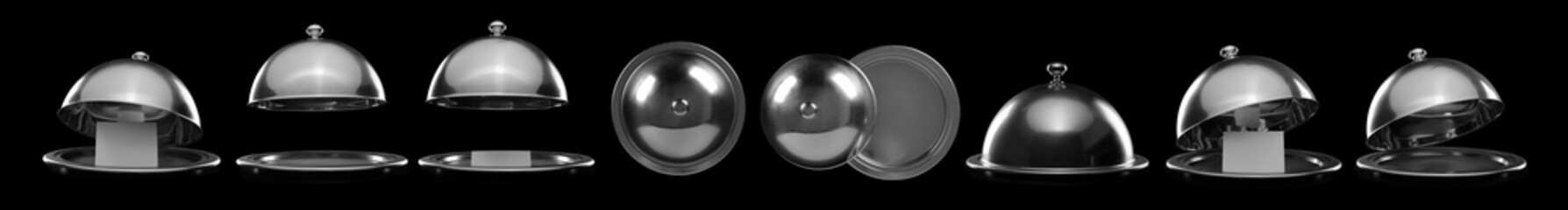 Trays with cloches on dark background © Pixel-Shot