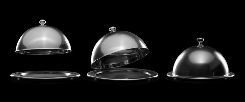 Trays with cloches on dark background