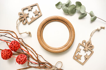 framework for invitation or congratulation. composition of a wooden heart, wooden jewelry and an envelope isolated on a white background. eco
