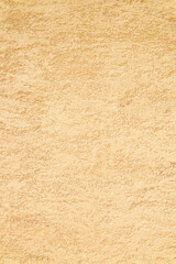 ベージュ色の土壁の表面