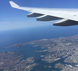 Fototapeta premium Airplane over Sydney Harbour