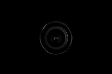 lens with a lens hood on a black background