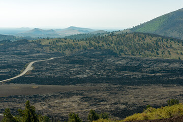 Aerial view of the road through the lava flows in Craters of the