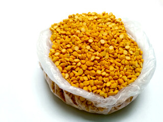 Split Chickpea Also Know as Chana Dal, Yellow Chana Split Peas, Dried Chickpea Lentils or Toor Dal isolated on white Background