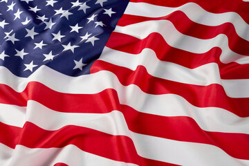 Close up of ruffled American flag. Satin texture curved flag of USA. Memorial Day or 4th of July....