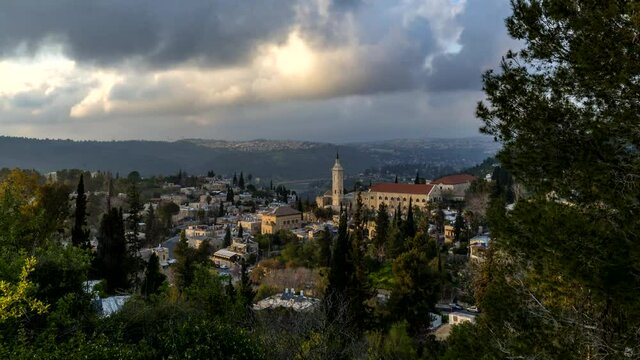 Ein Karem, biblical birth place of John the Baptist, with Catholic Church of Saint John the Baptist; beautiful time lapse of moving clouds; Jerusalem Israel
