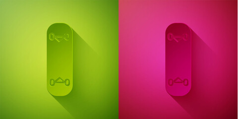 Paper cut Skateboard trick icon isolated on green and pink background. Extreme sport. Sport equipment. Paper art style. Vector Illustration.