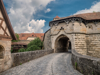 Obraz premium Ancient city gate in Rothenburg ob der Tauber, Germany