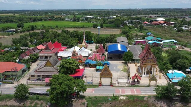 Aerial city view from flying drone at Wat Prem Prachakon ,Chiang Rak Noi, Bang Pa-in District, Phra Nakhon Si Ayutthaya,Thailand
