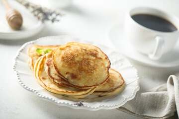 Homemade pancakes with organic honey