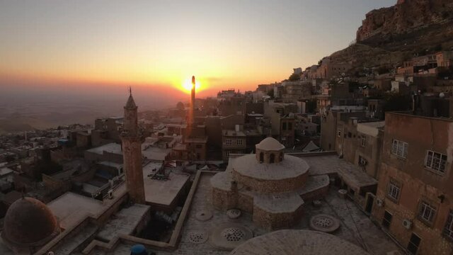 Mardin, Turkey - November 2019: Time lapse video of sunset in Mardin Old city cityscape