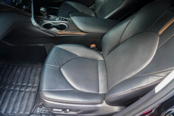 close up leather passenger seat in the luxury car
