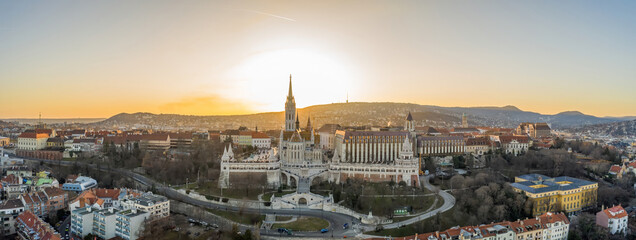 Panoramic aerial drone shot of Fisherman's Bastion on Buda Hill in Budapest sunset
