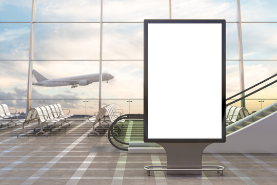 Airport departure lounge. Blank billboard stand and airplane on background.