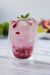 Pomegranate cocktail. Summer light alcoholic drink.