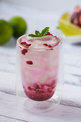 Pomegranate cocktail. Summer light alcoholic drink.