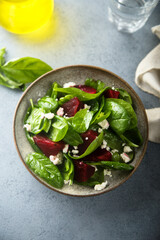Healthy spinach salad with beetroot and cheese