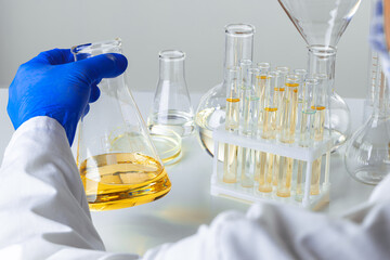Close up of hands of a scientist working with laboratory samples