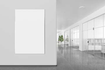 Blank poster mockup  on the wall in modern office interior with clipping path around banner.