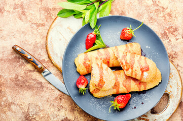 Homemade pies with strawberries.