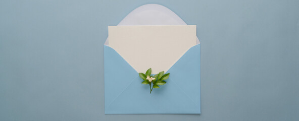 Mock-up greeting card, envelope, card paper on light blue background