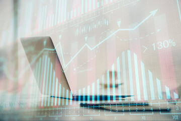 Multi exposure of chart and financial info and work space with computer background. Concept of international online trading.