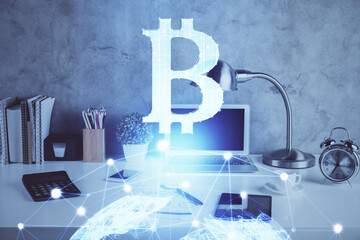 Double exposure of blockchain and crypto economy theme hologram and table with computer background....