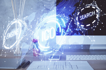 Double exposure of blockchain and crypto economy theme hologram and table with computer background. Concept of bitcoin cryptocurrency.