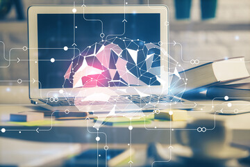 Double exposure of work space with computer and human brain drawing hologram. Brainstorm concept.