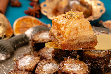 Turkish arabic desserts on silver plate close up