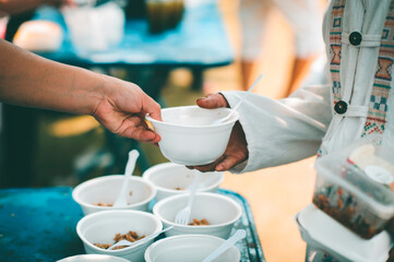 Donate food to the poor : concept Sharing Food With Homeless