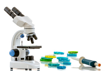 Microscope, on white background symol of research, laboratory, medicine and science