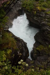 Fototapeta na wymiar Beautiful waterfall surrounded by Norwegian nature