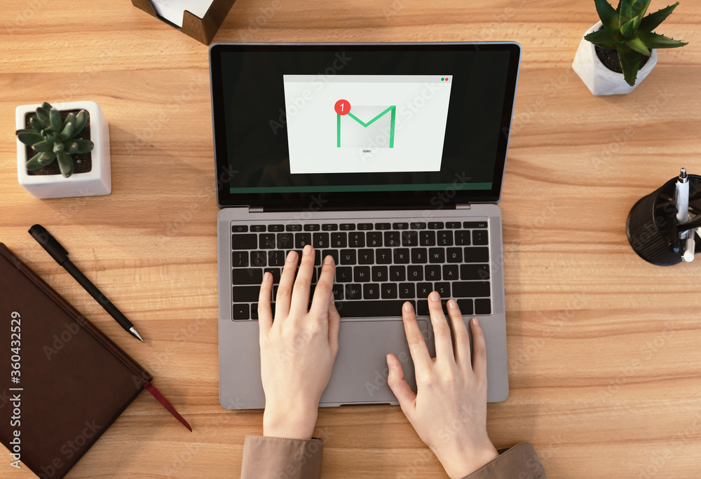 Poster email notification. woman working on laptop with mail envelope icon on screen