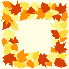 a wreath of autumn leaves in yellow and orange on a beige background