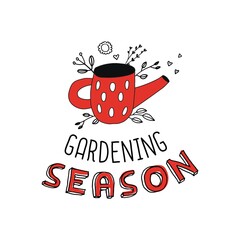 Gardening season. The inscription with a red watering can and flowers.