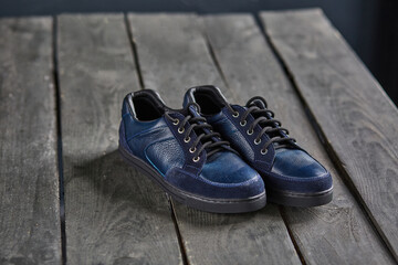 blue shoes on a wooden