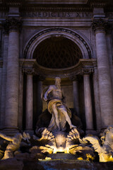 Neptune in the Trevi Fountain at night in Rome