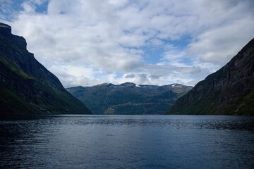 Fototapeta na wymiar Scenic view of Geirangerfjord from boat trip through the fjord, Norway