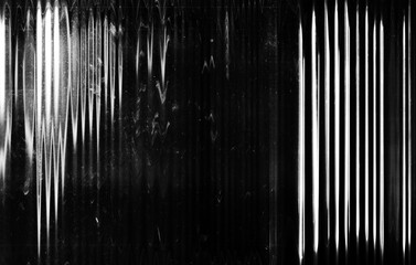 Glitch abstract background. TV noise. Black white distortion artifacts scratched screen with dust.